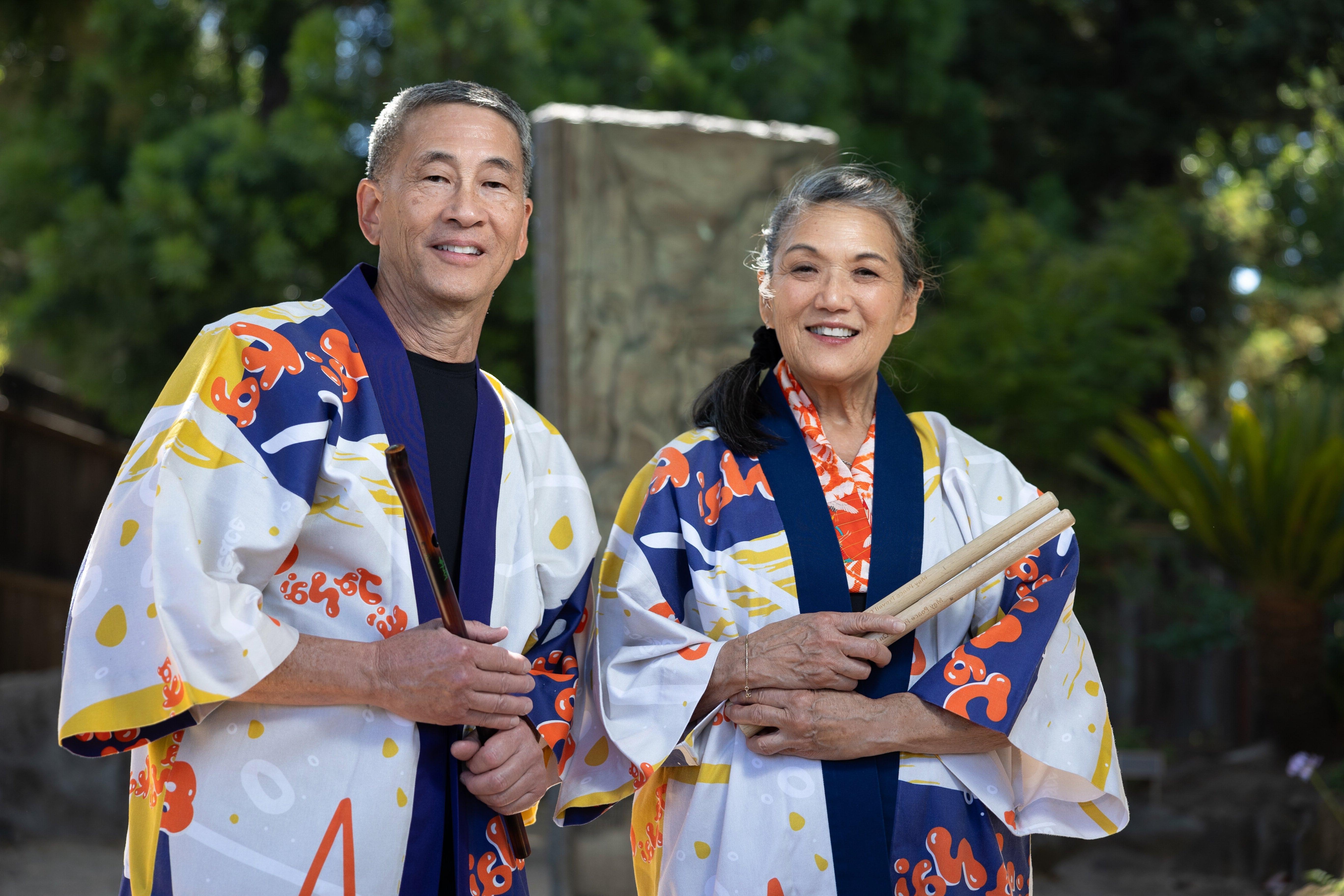 Patti Jo “PJ” Hirabayashi, ’77 MUP (left) and Roy Hirabayashi celebrate 50 years of creating dance, music and art with San José Taiko in 2023. Photo: Jim Gensheimer.